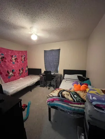 a room with furniture and air hockey table