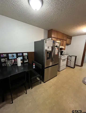 a view of a workspace with furniture