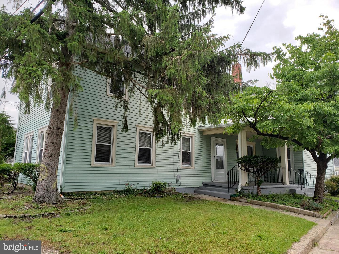 a backyard of a house with seating space