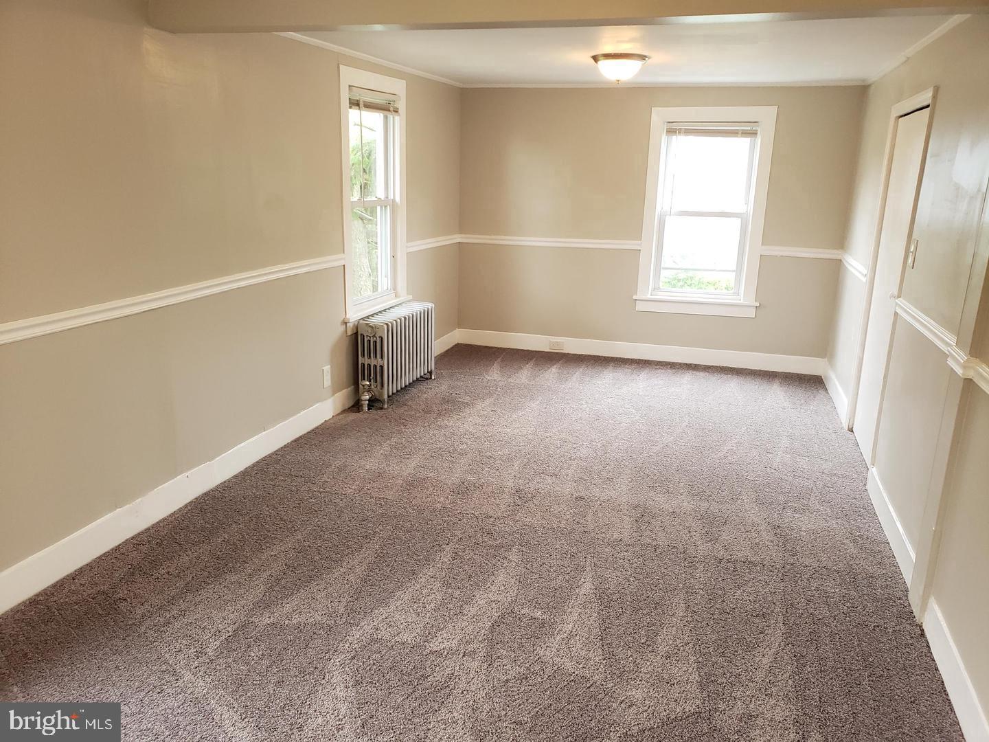 3 North Summit Avenue, Unit 3A Pitman, NJ 08071 - Photo 15 of 22 an empty room with windows