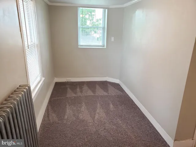 a bathroom with a sink a toilet and bathtub