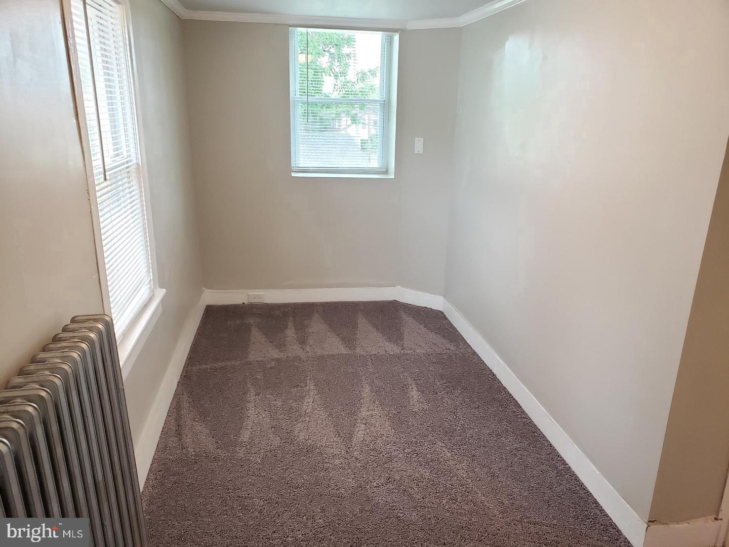 3 North Summit Avenue, Unit 3A Pitman, NJ 08071 - Photo 19 of 22 an empty room with windows