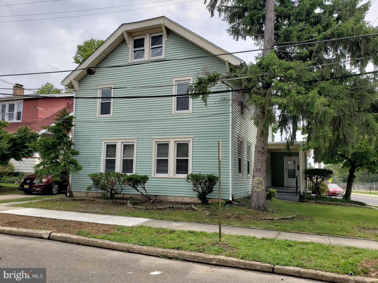 3 North Summit Avenue, Unit 3A Pitman, NJ 08071 - Photo 2 of 22 a front view of a house with a yard