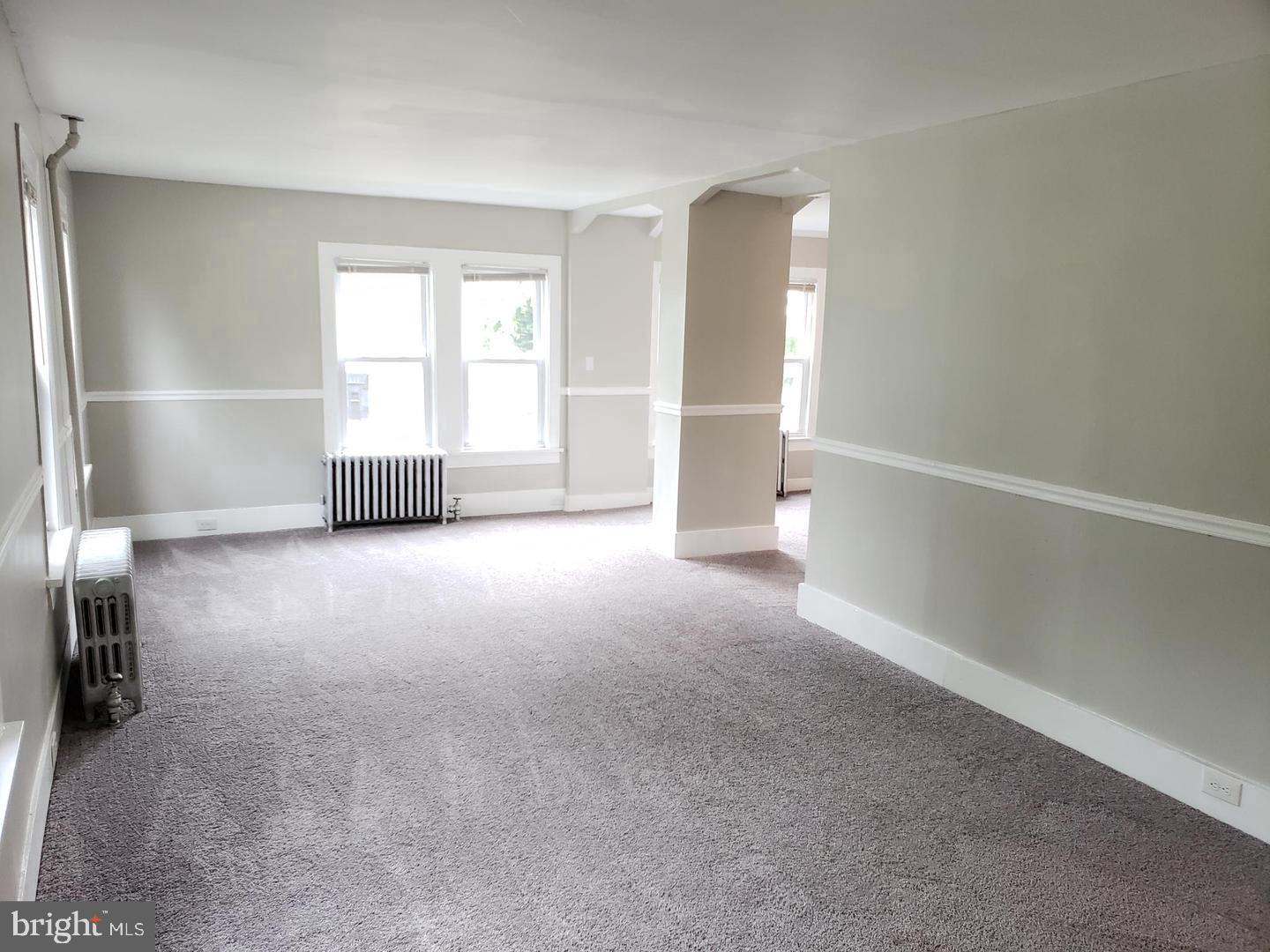 3 North Summit Avenue, Unit 3A Pitman, NJ 08071 - Photo 6 of 22 a view of empty room with a fireplace
