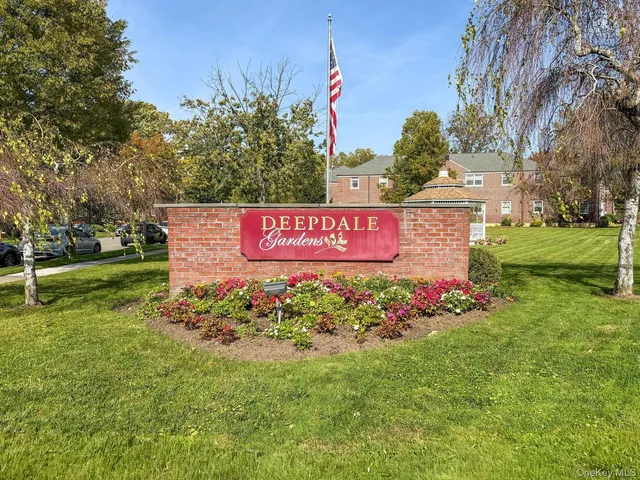 a sign that is sitting in the grass