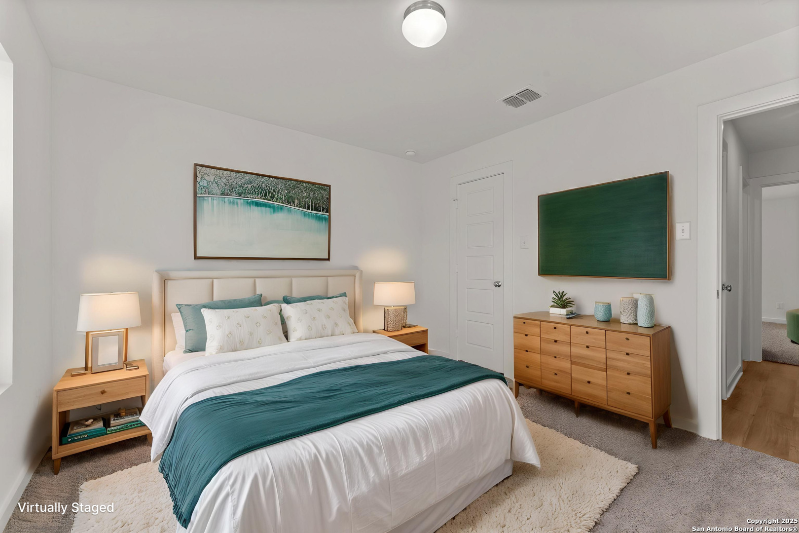 2804 Whiskey Pass Seguin, TX 78155 - Photo 18 of 28 a bedroom with a bed and a flat screen tv