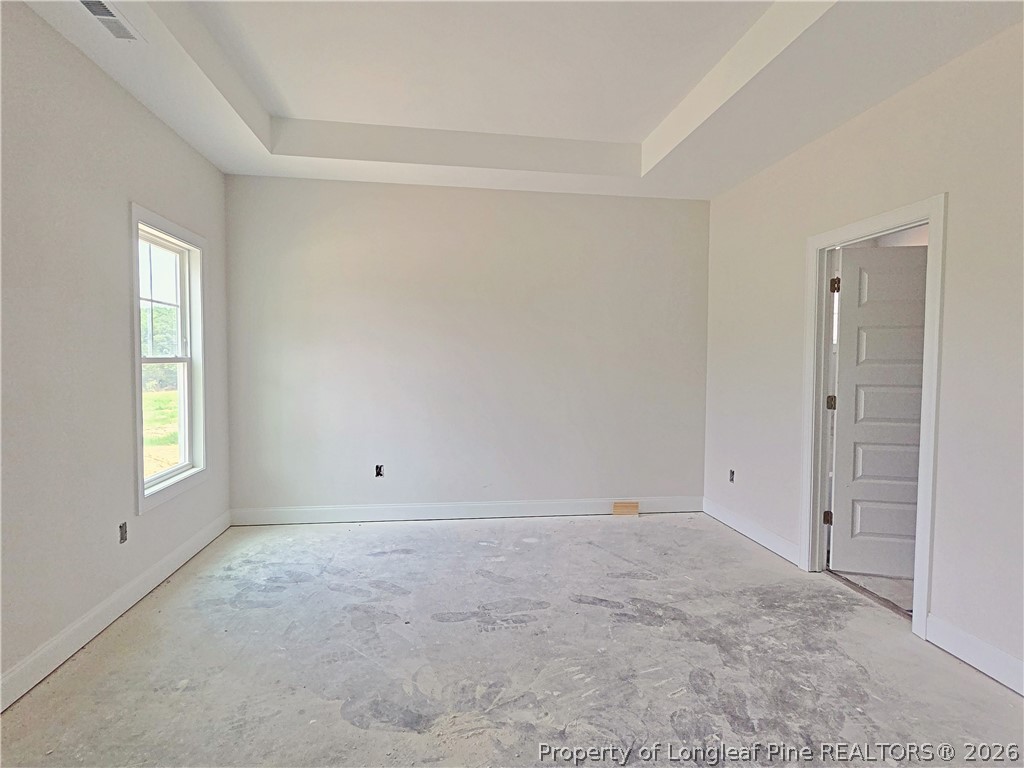 2678 Norrington Road Lillington, NC 27546 - Photo 13 of 31 a view of an empty room with a window