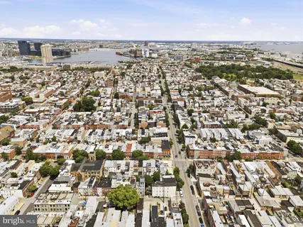 an aerial view of residential building with parking space
