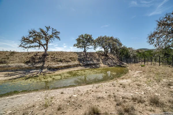 a view of a lake with mountains in the background