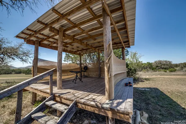 a view of livingroom with furniture and floor to ceiling window