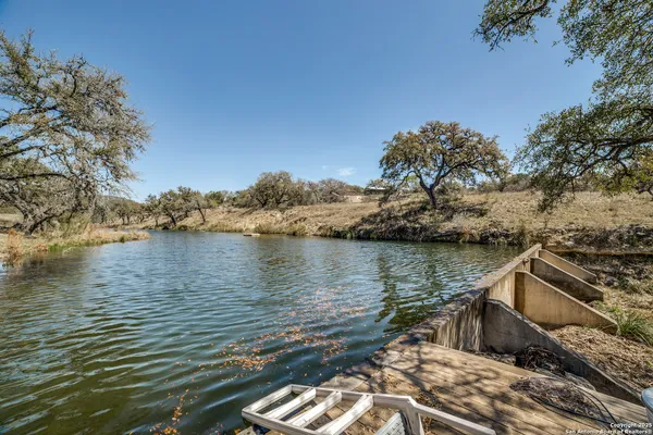a view of patio with a yard