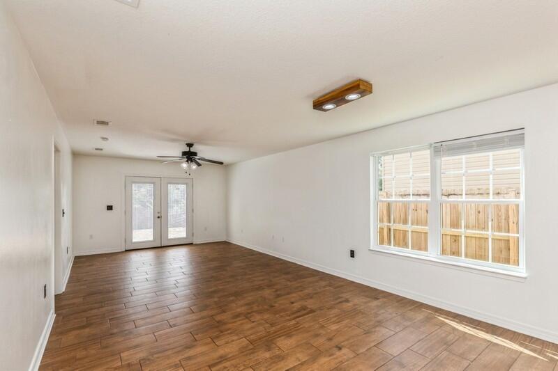 412 Eisenhower Drive Crestview, FL 32539 - Photo 12 of 35 a view of an empty room with a window
