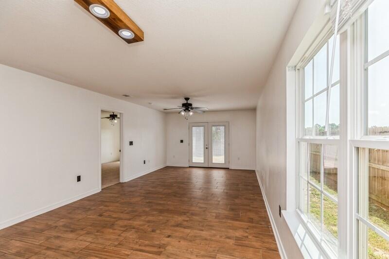 412 Eisenhower Drive Crestview, FL 32539 - Photo 13 of 35 a view of an empty room with a window