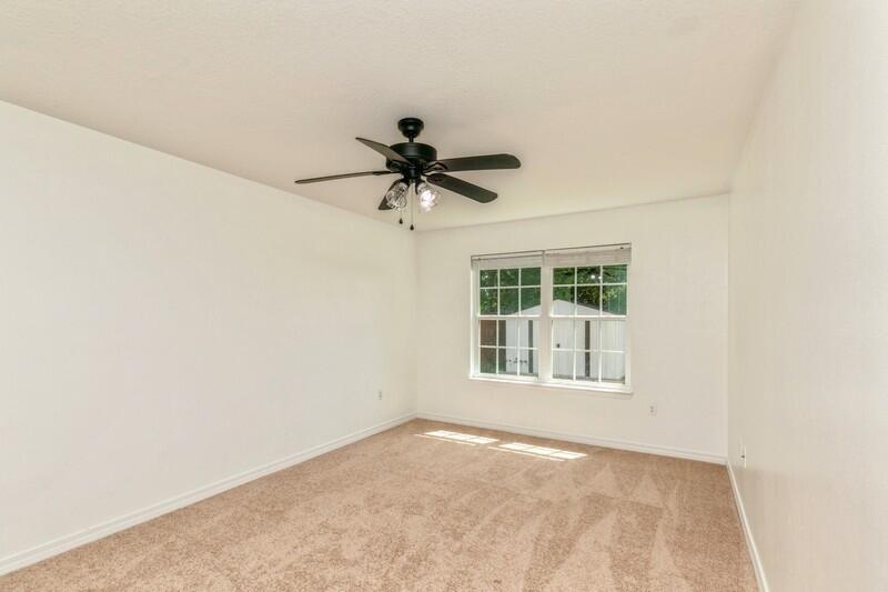412 Eisenhower Drive Crestview, FL 32539 - Photo 17 of 35 a view of empty room with ceiling fan