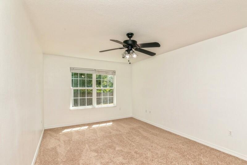 412 Eisenhower Drive Crestview, FL 32539 - Photo 18 of 35 an empty room with a window