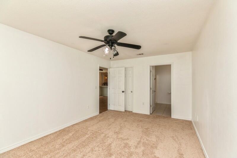 412 Eisenhower Drive Crestview, FL 32539 - Photo 19 of 35 a view of a room with a ceiling fan