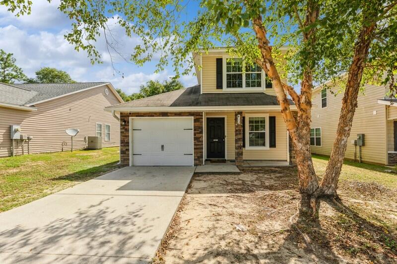 412 Eisenhower Drive Crestview, FL 32539 - Photo 2 of 35 a front view of a house with a yard