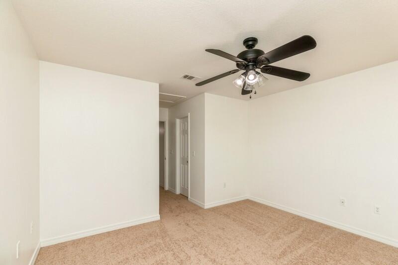 412 Eisenhower Drive Crestview, FL 32539 - Photo 30 of 35 a view of a chandelier fan in a room