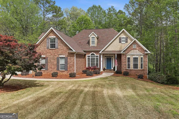 $569,000 | 25 Lyndhurst Way, Sharpsburg, GA 30277