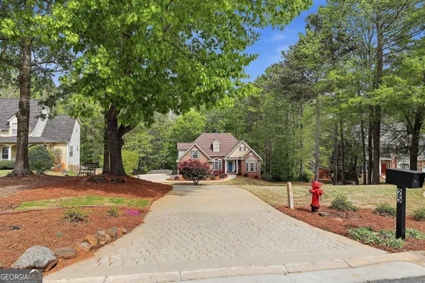 $569,000 | 25 Lyndhurst Way, Sharpsburg, GA 30277