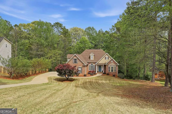 $569,000 | 25 Lyndhurst Way, Sharpsburg, GA 30277