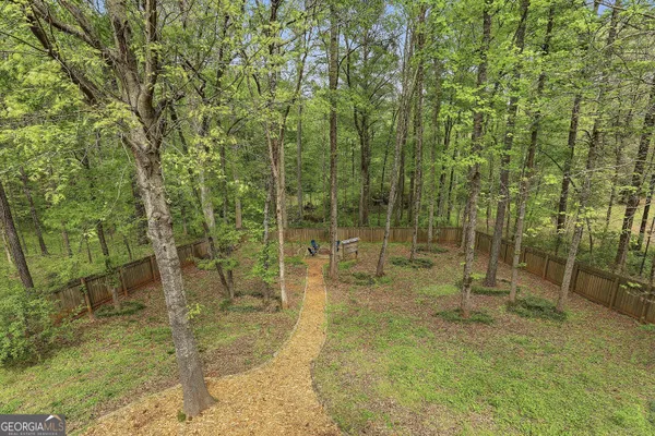$569,000 | 25 Lyndhurst Way, Sharpsburg, GA 30277