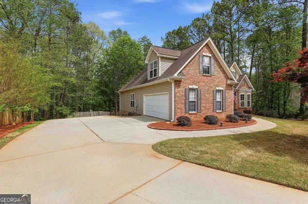 $569,000 | 25 Lyndhurst Way, Sharpsburg, GA 30277