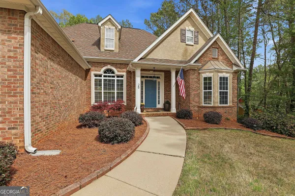 $569,000 | 25 Lyndhurst Way, Sharpsburg, GA 30277
