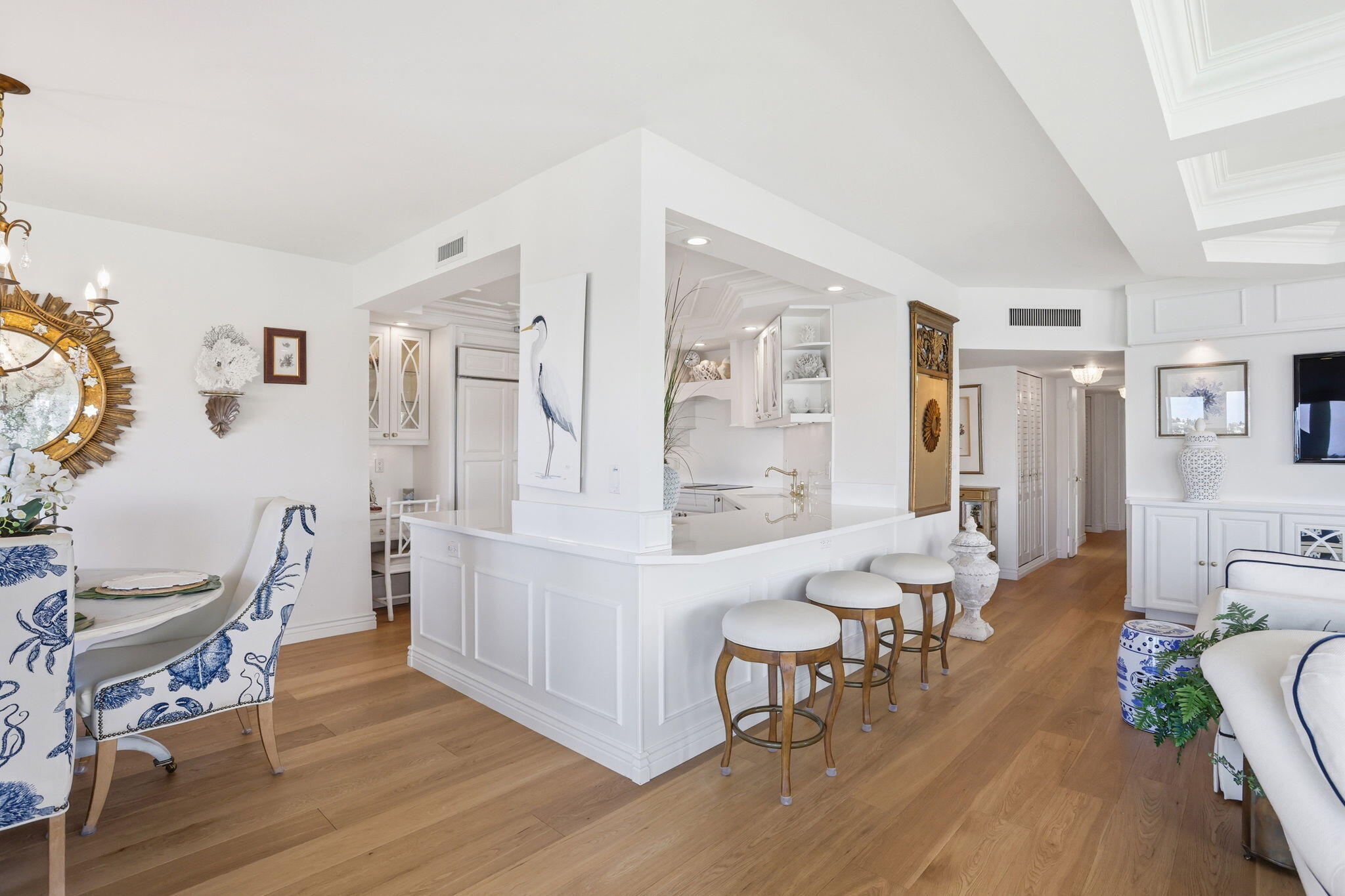 701 East Camino Real, Unit 2J Boca Raton, FL 33432 - Photo 11 of 51 a living room with furniture and a wooden floor
