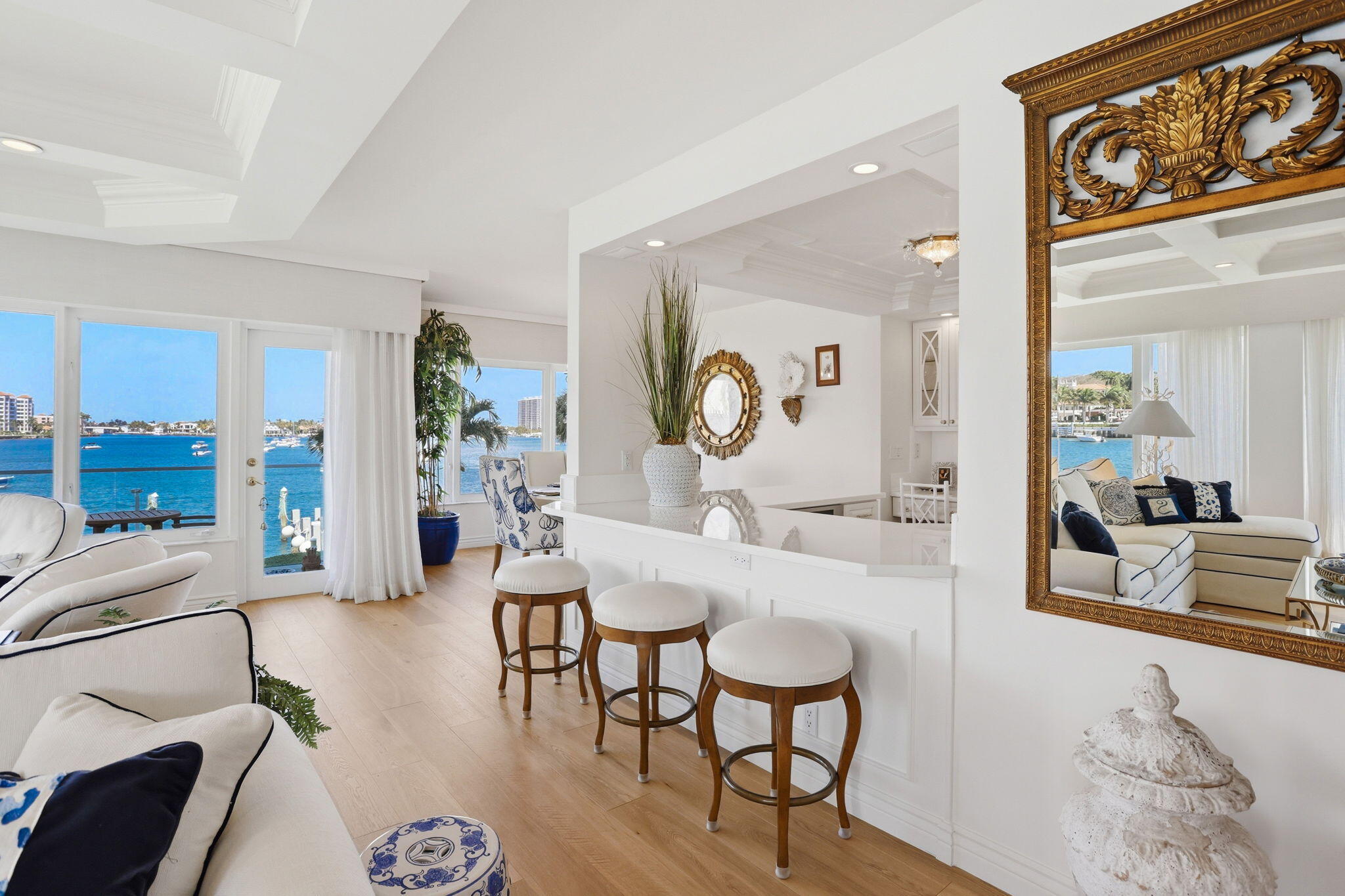 701 East Camino Real, Unit 2J Boca Raton, FL 33432 - Photo 12 of 51 a living room with furniture and a large window