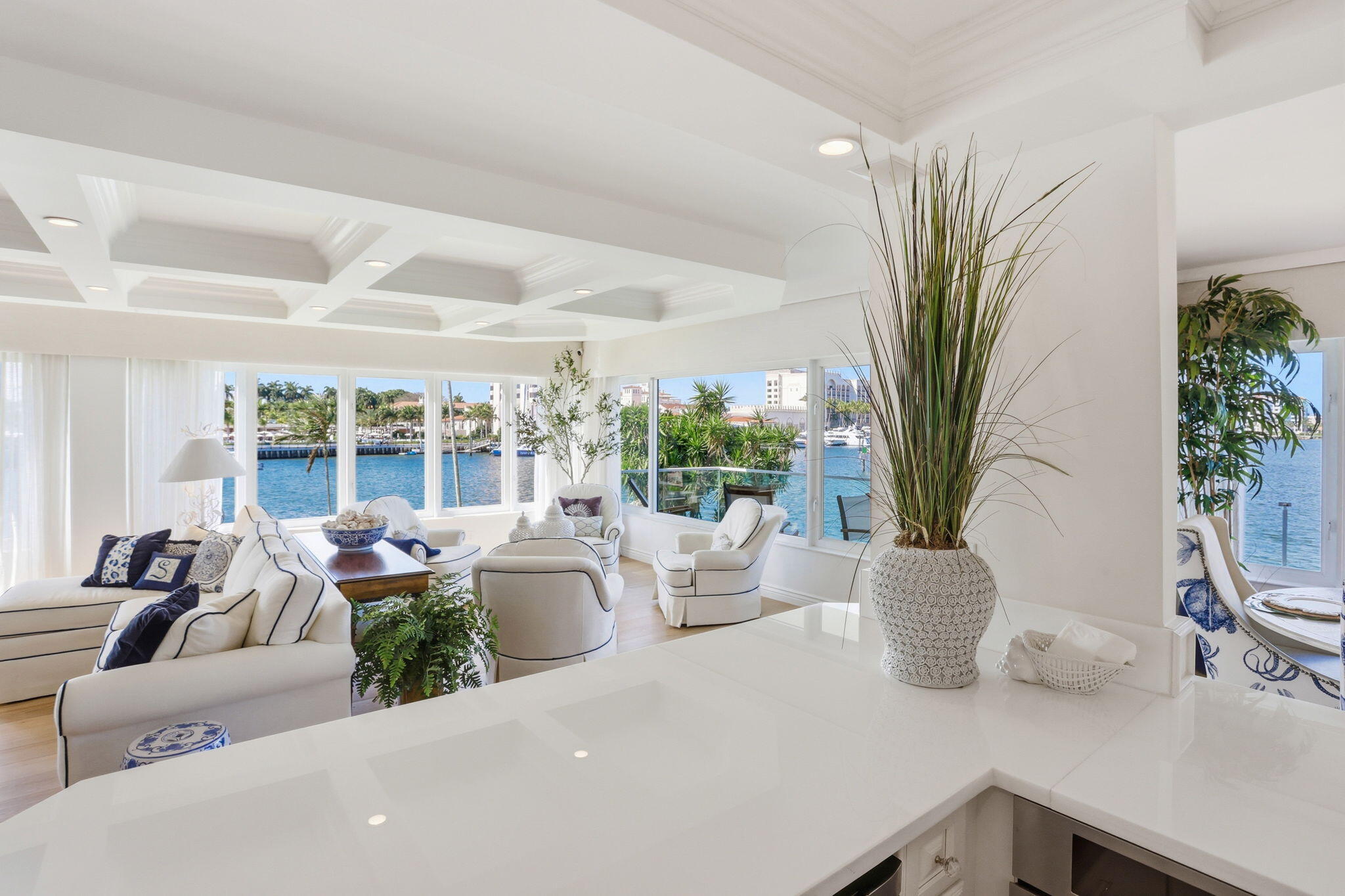 701 East Camino Real, Unit 2J Boca Raton, FL 33432 - Photo 17 of 51 a living room with furniture potted plant and a large window