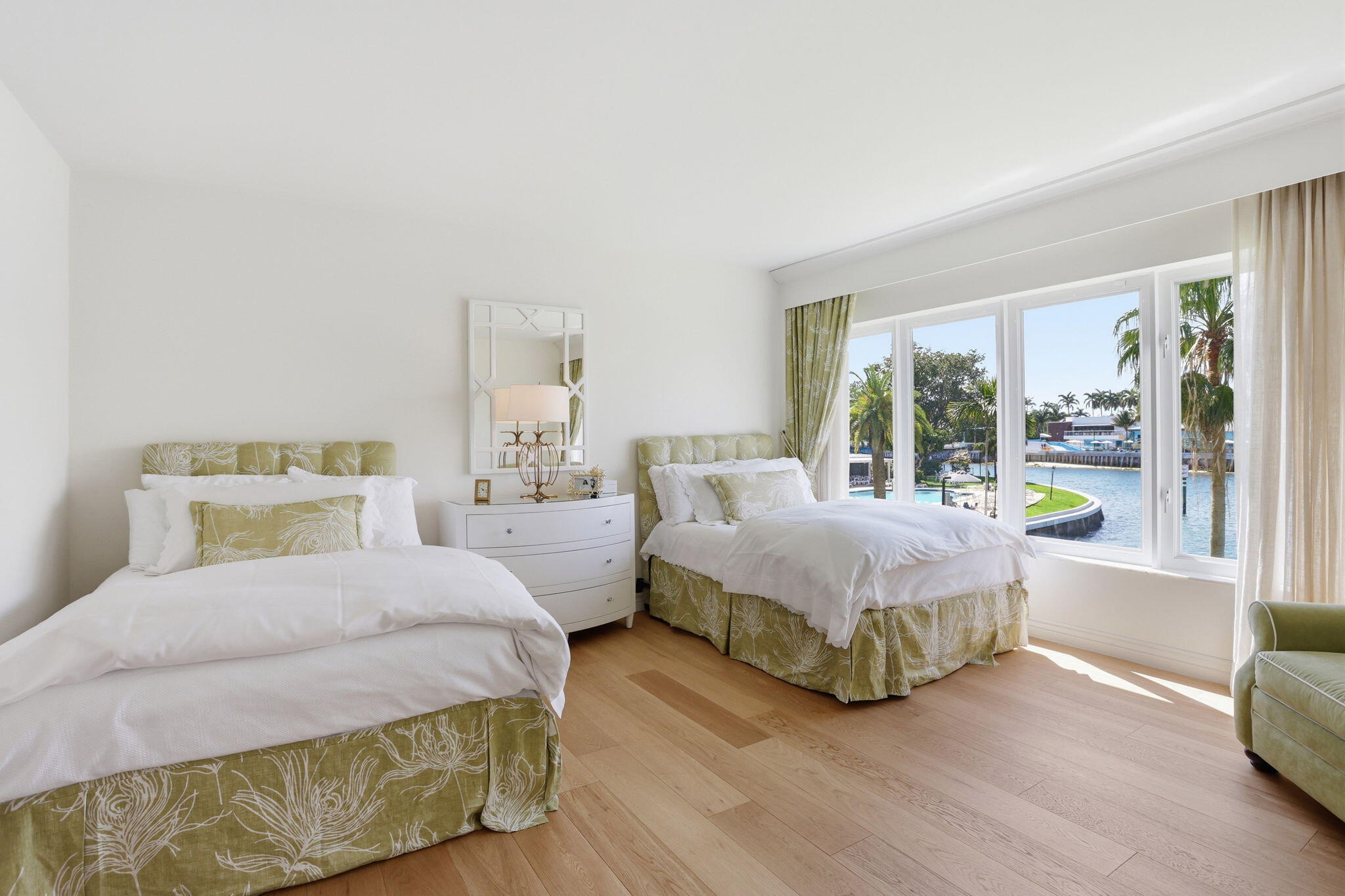 701 East Camino Real, Unit 2J Boca Raton, FL 33432 - Photo 26 of 51 a bedroom with double bed and a large window