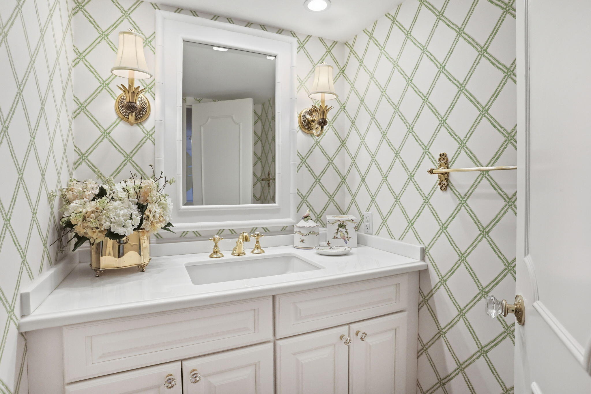 701 East Camino Real, Unit 2J Boca Raton, FL 33432 - Photo 27 of 51 a bathroom with a sink and a mirror