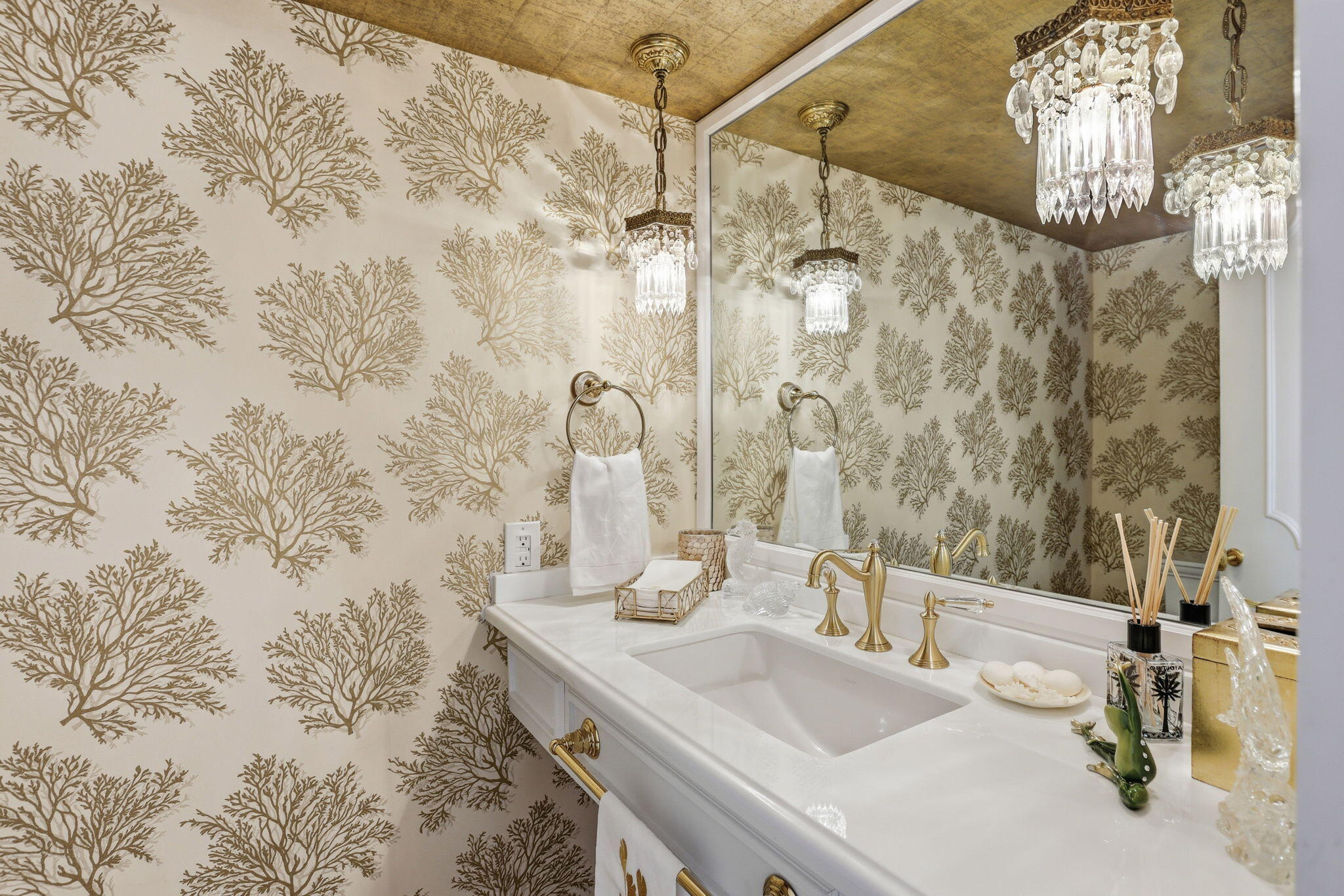 701 East Camino Real, Unit 2J Boca Raton, FL 33432 - Photo 29 of 51 a bathroom with a sink and a mirror