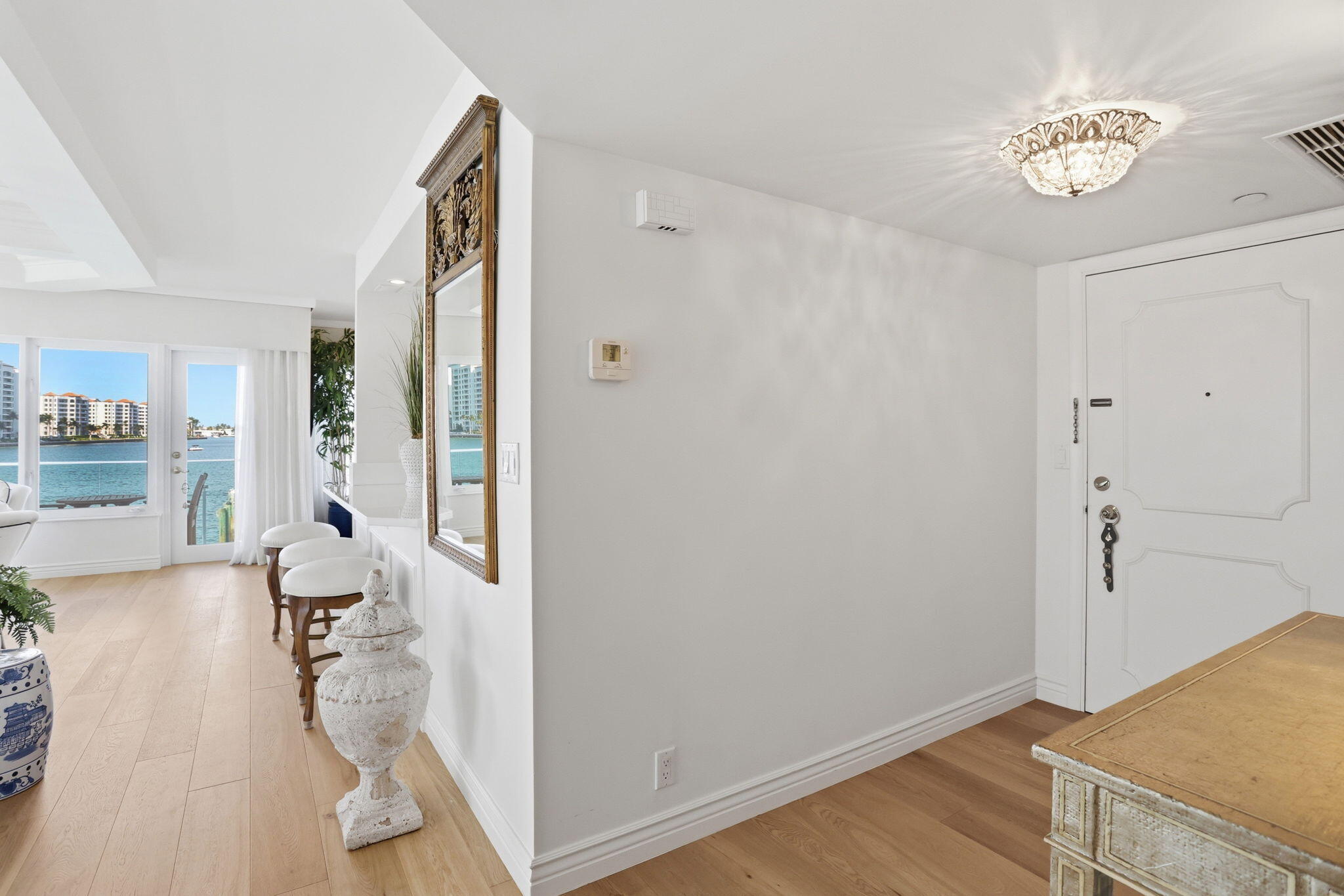 701 East Camino Real, Unit 2J Boca Raton, FL 33432 - Photo 31 of 51 a view of livingroom with furniture and wooden floor