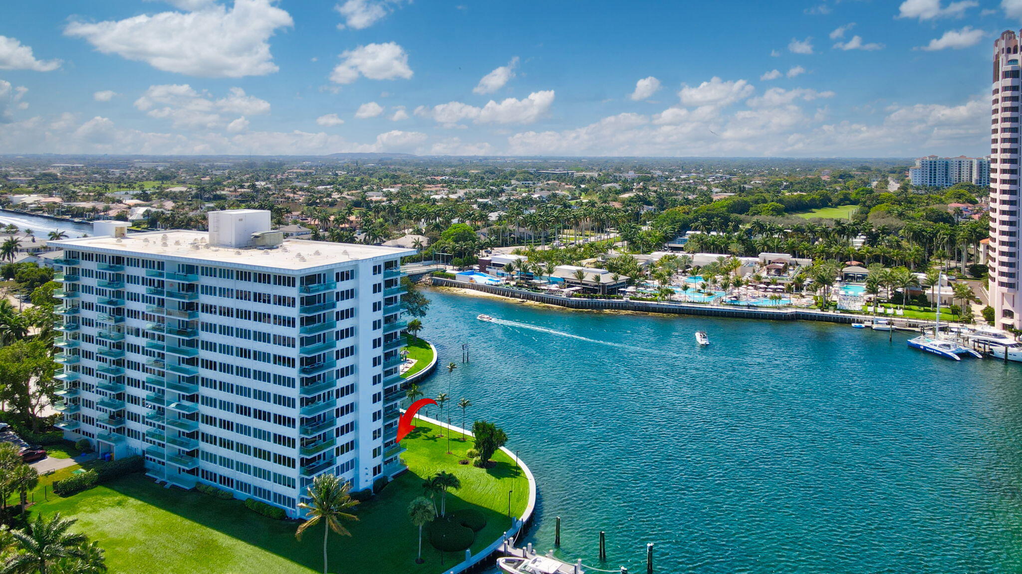 701 East Camino Real, Unit 2J Boca Raton, FL 33432 - Photo 35 of 51 a view of a lake with a city