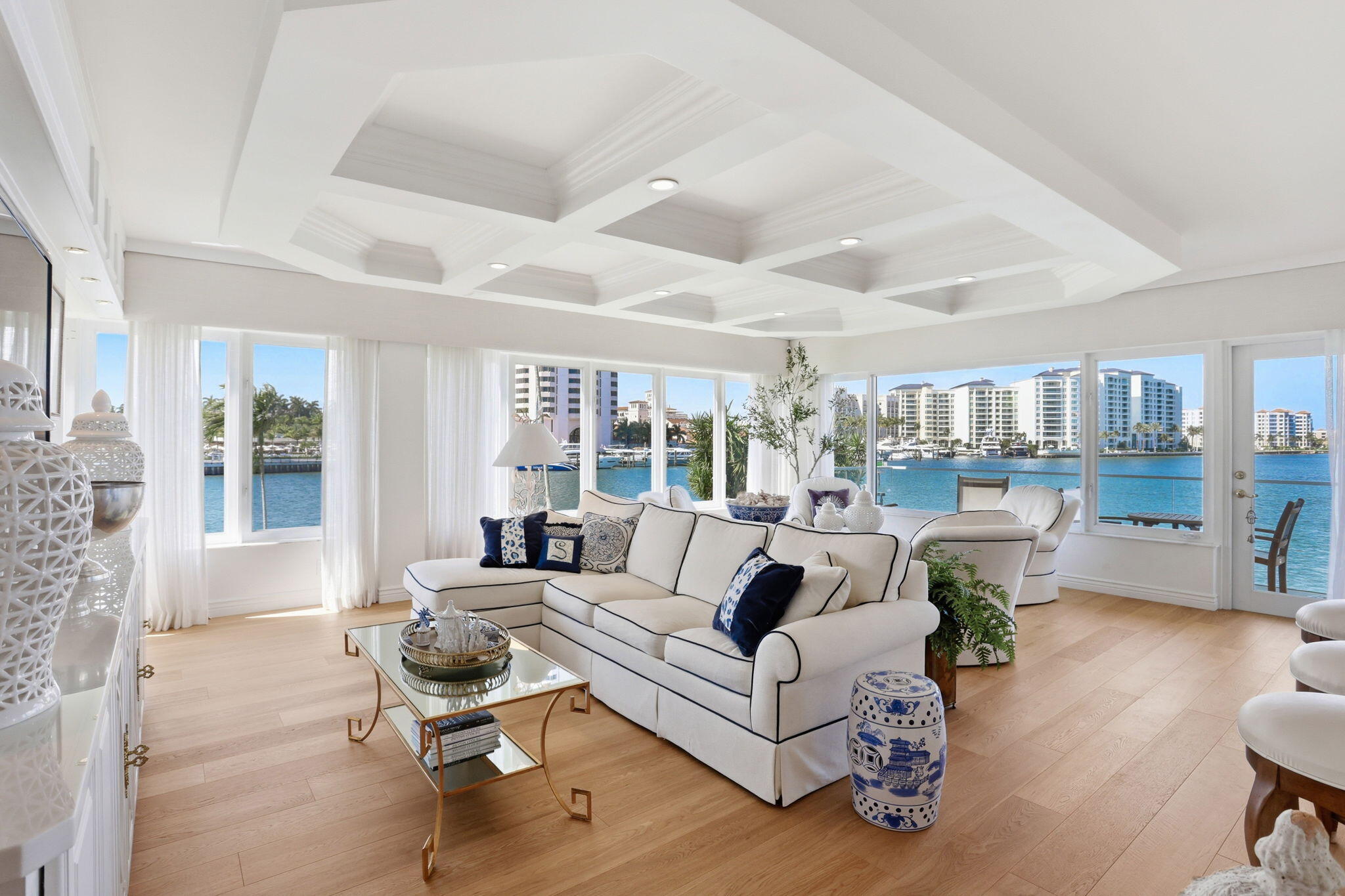 701 East Camino Real, Unit 2J Boca Raton, FL 33432 - Photo 5 of 51 a living room with furniture and a large window