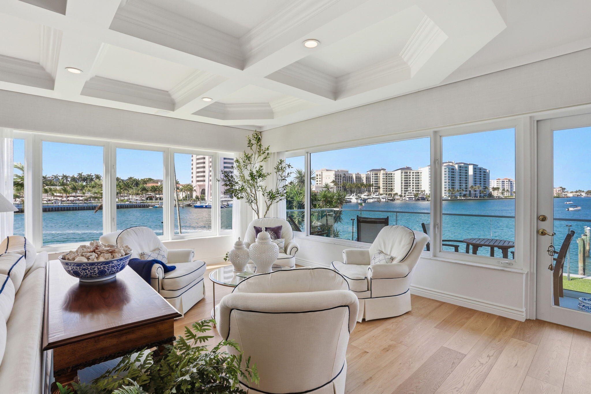 701 East Camino Real, Unit 2J Boca Raton, FL 33432 - Photo 6 of 51 a living room with furniture and a large window