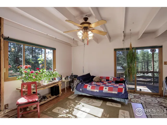 a kitchen with stainless steel appliances a stove a refrigerator and cabinets