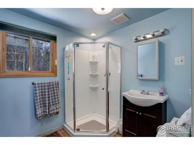 a view of a hallway with staircase