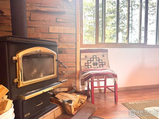 a living room with a rug floor and a table