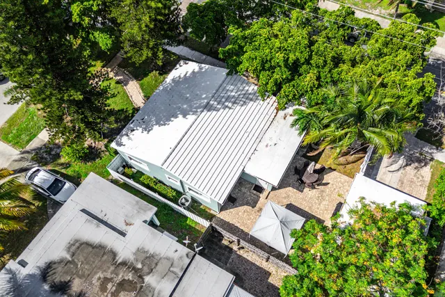 an aerial view of a house with garden