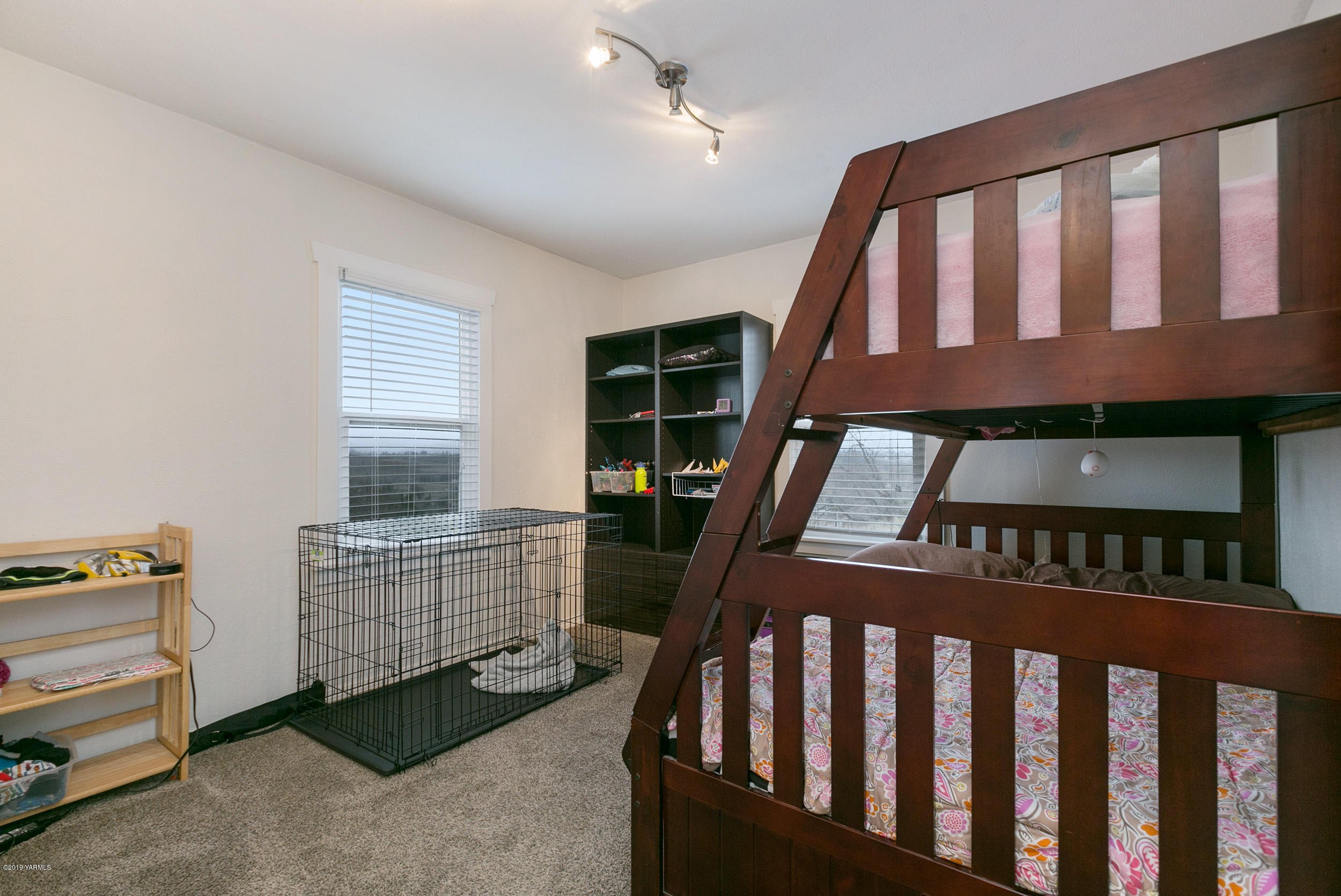 11130 Estes Road Yakima, WA 98908 - Photo 13 of 16 a bedroom with furniture and a window