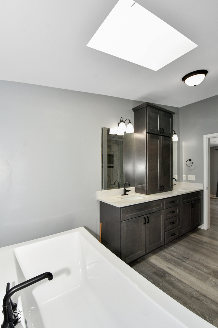 18530 West 3000N Road Reddick, IL 60961 - Photo 25 of 40 a kitchen with granite countertop a sink and cabinets