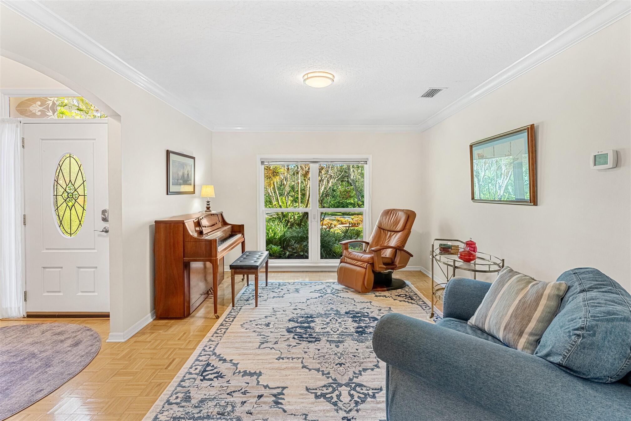 3660 Brennan Drive Melbourne, FL 32934 - Photo 15 of 71 a living room with furniture and a window