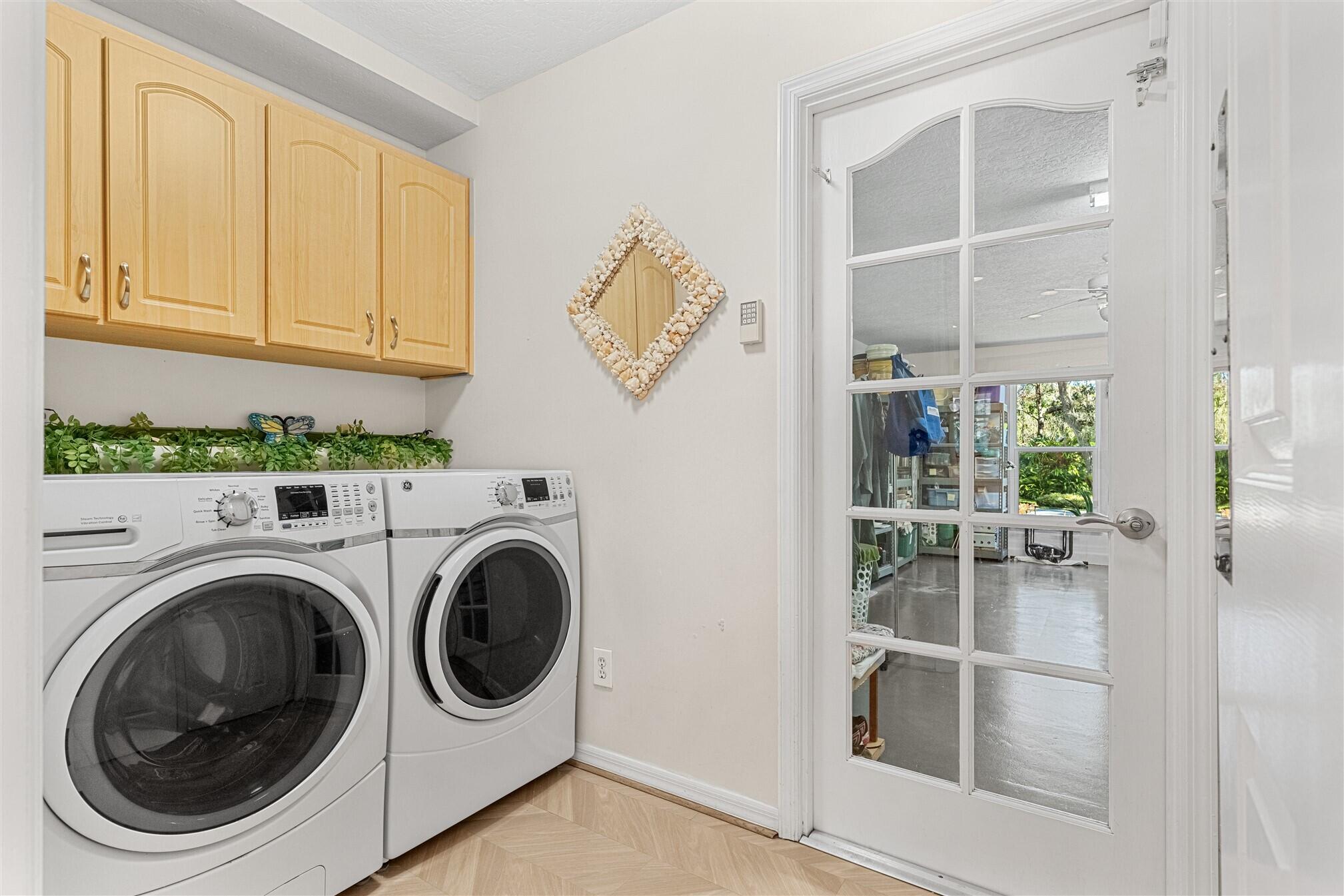 3660 Brennan Drive Melbourne, FL 32934 - Photo 23 of 71 a utility room with dryer and washer