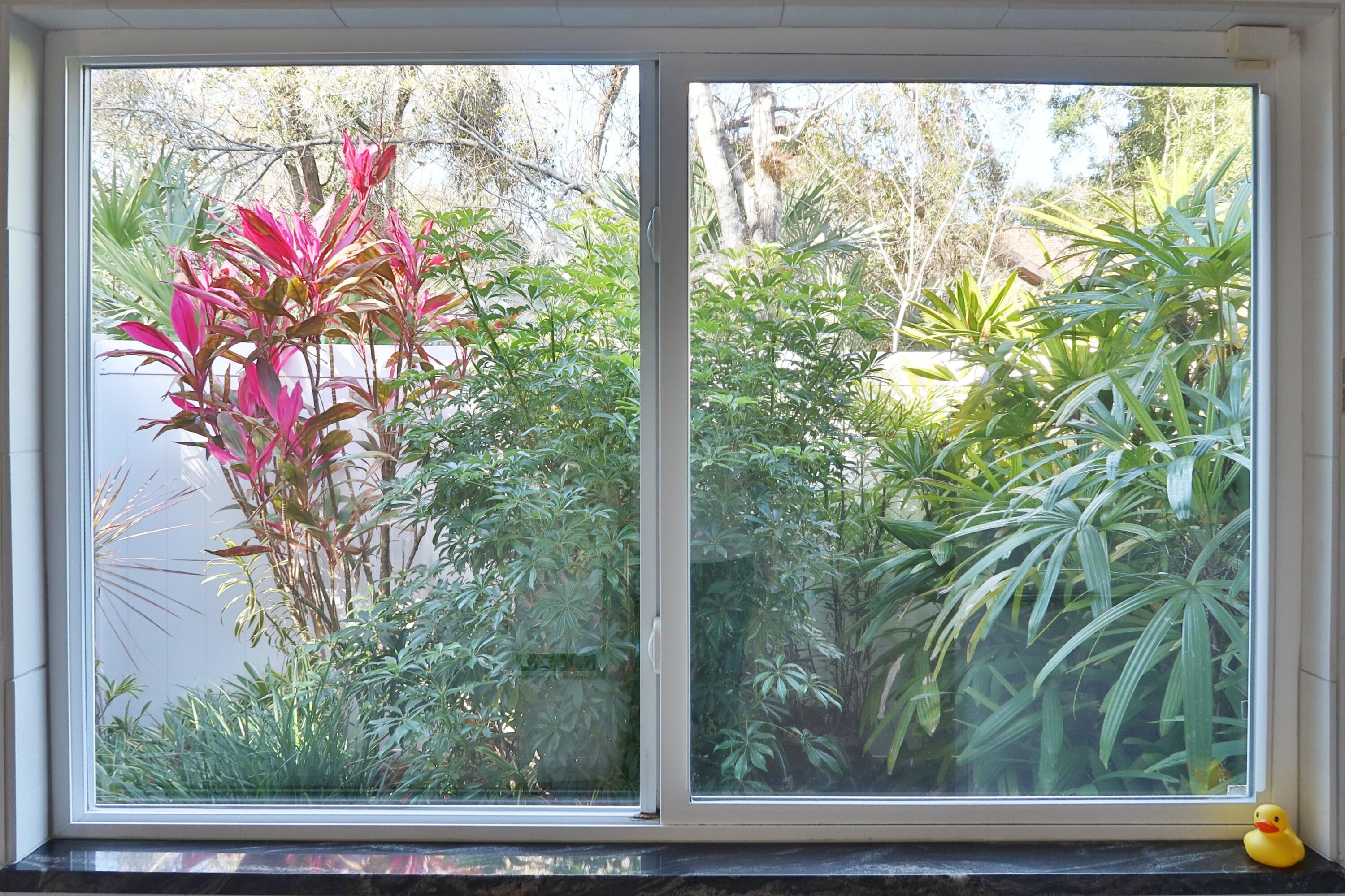 3660 Brennan Drive Melbourne, FL 32934 - Photo 27 of 71 a view of a window in a yard