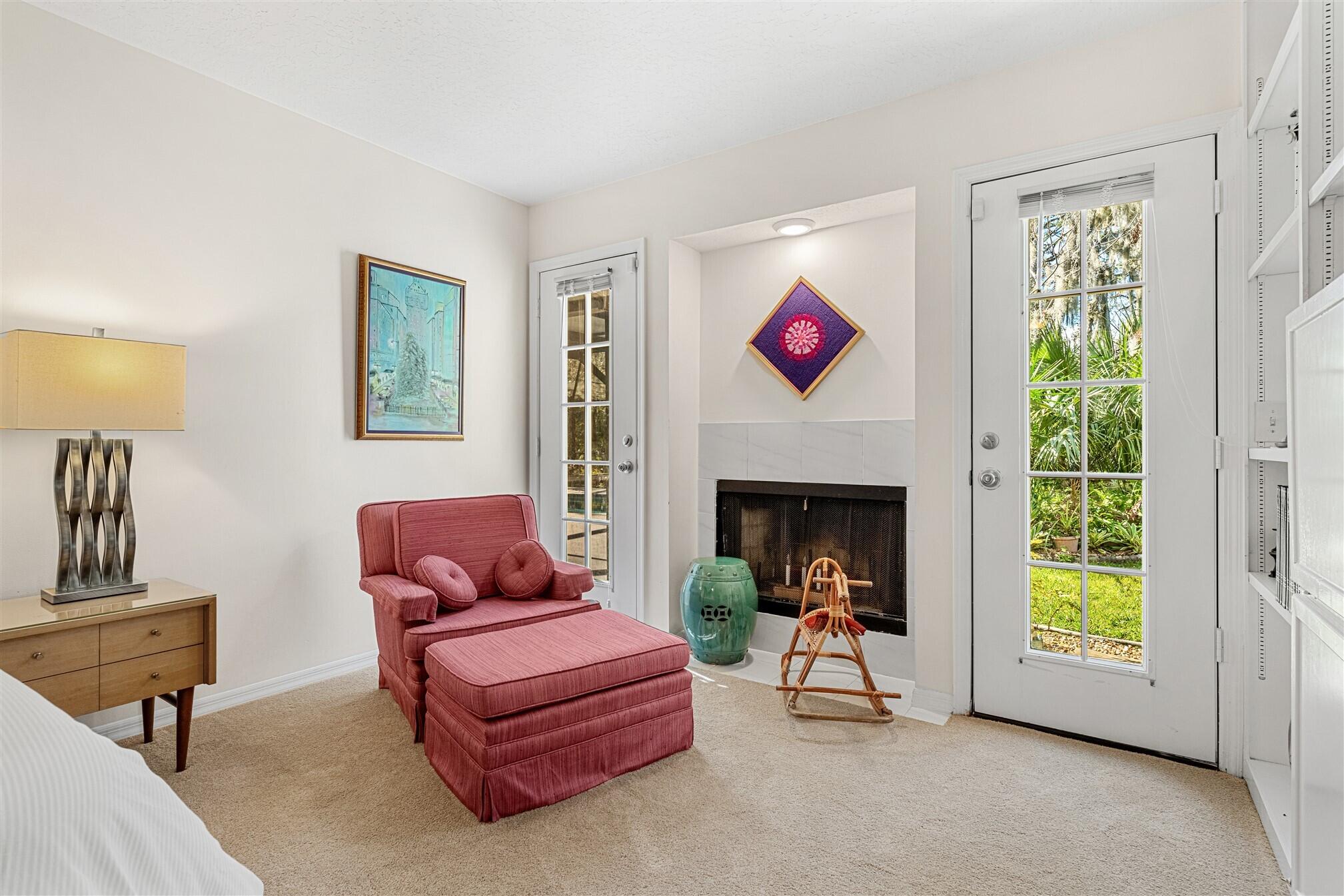 3660 Brennan Drive Melbourne, FL 32934 - Photo 29 of 71 a living room with furniture and a fireplace