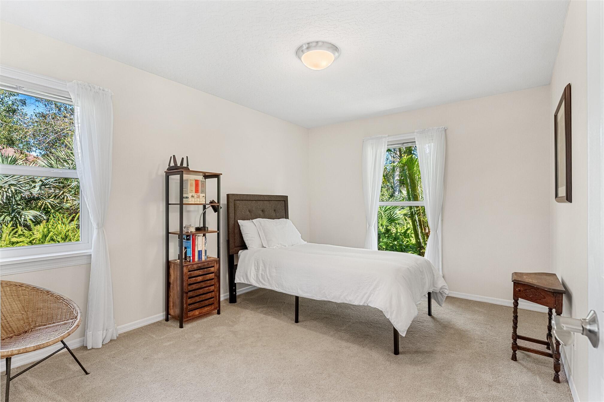 3660 Brennan Drive Melbourne, FL 32934 - Photo 32 of 71 a living room with furniture and a window