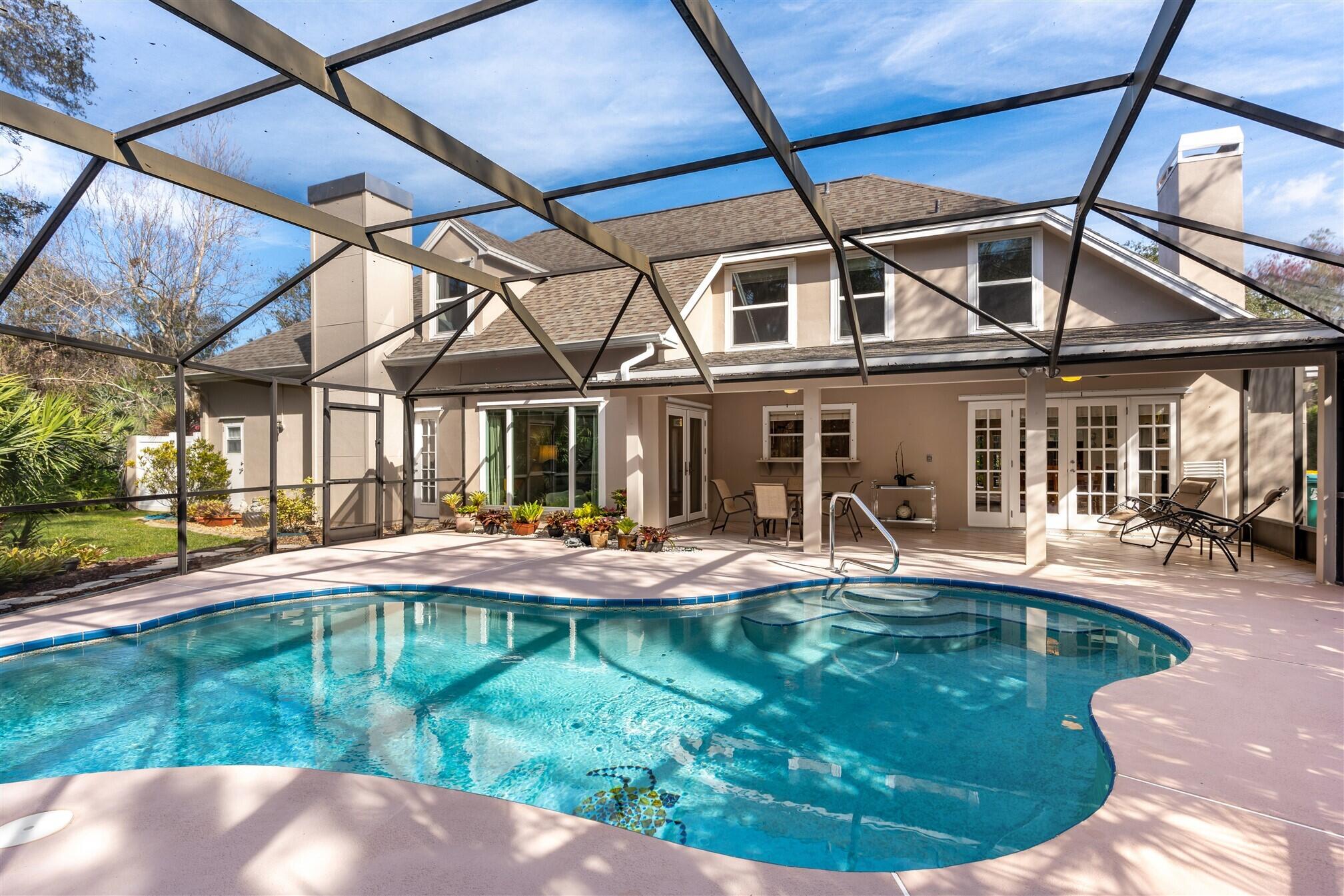3660 Brennan Drive Melbourne, FL 32934 - Photo 48 of 71 a view of a house with swimming pool